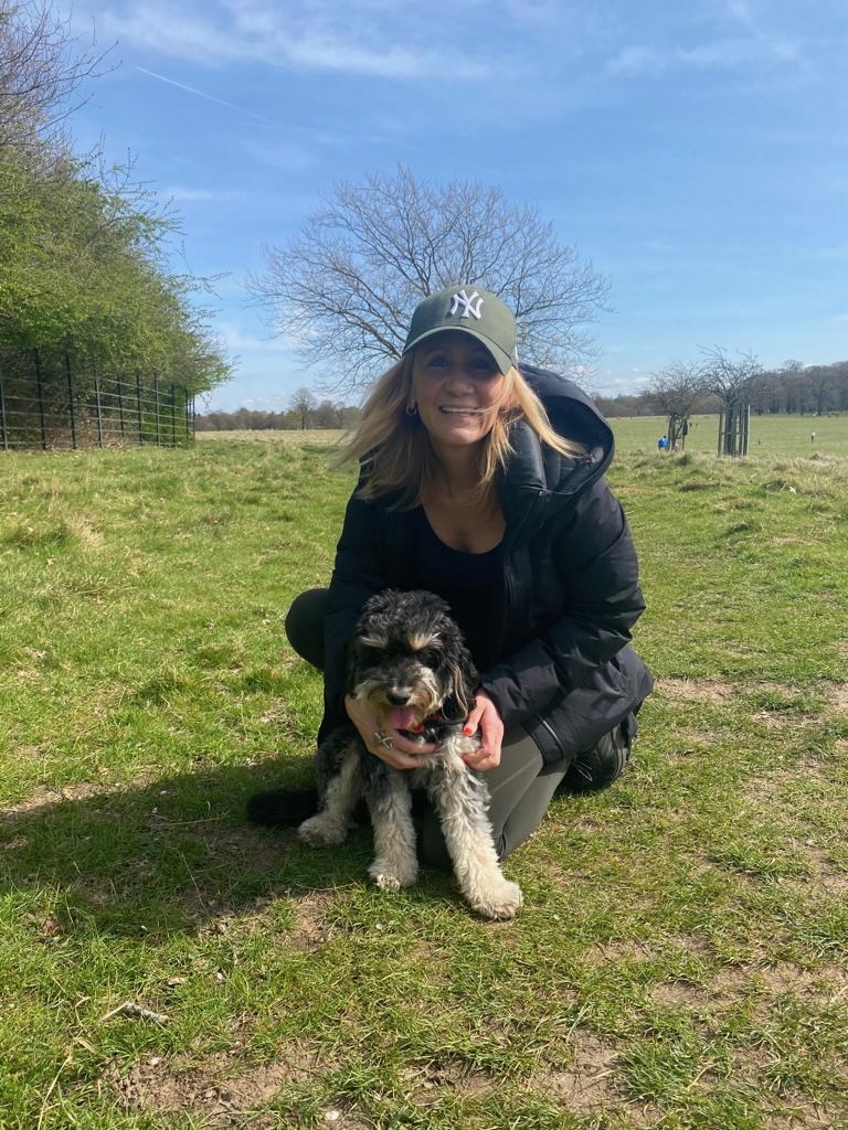 Sara enjoys quality time with her dog to help reset the mind.