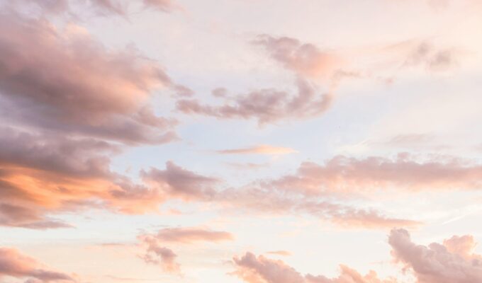 Soft pastel clouds at sunset — calming and gentle, evoking nervous system regulation and emotional ease