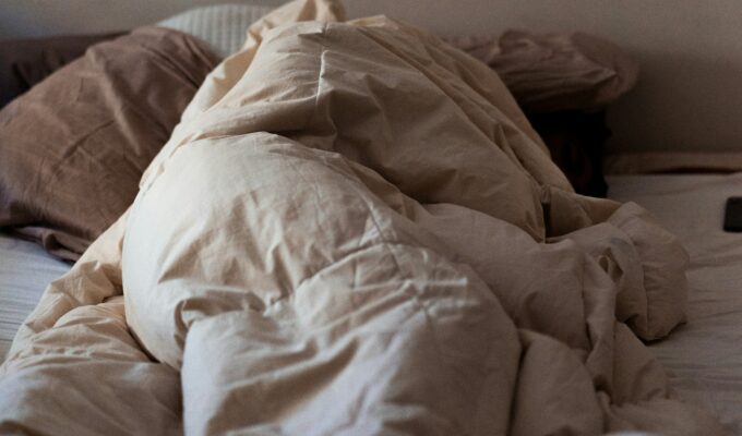 cream duvet on a bed